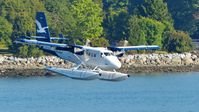 C-GQKN @ CYHC - Westcoast Air #606 coming over Stanley Park for a straight in approach to land in Coal Harbour. - by M.L. Jacobs