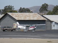 N7813N @ SZP - 1974 Cessna 182P SKYLANE, Continental O-470 230 hp, holding short 22 - by Doug Robertson