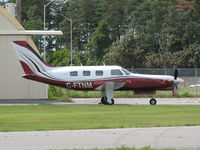 C-FTNM @ CYOW - This 1986 Piper PA46-310P sits lonely outside it's hanger at Ottawa's MacDonald-Cartier Int'l Airport (CYOW) - by Ron Coates