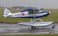 N5362X @ EGSH - Departing a very wet NWI...