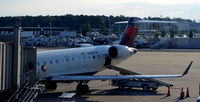 N690CA @ KRIC - Loading baggage RIC - by Ronald Barker