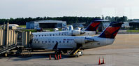 N824AY @ KRIC - At the gate with N690CA RIC - by Ronald Barker