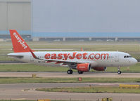 G-EZWM @ AMS - Taxi to runway 27 of Schiphol Airport - by Willem Göebel
