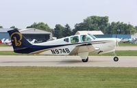 N974B @ KOSH - Beech A33 - by Mark Pasqualino