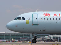 C-FFWN @ CYYZ - This 1991 Boeing A320 is heading to runway 23 at Toronto's Lester B. Pearson Int'l Airport (CYYZ) - by Ron Coates