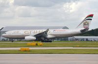 A6-EYO @ EGCC - Etihad A332 comming to a stop. - by FerryPNL