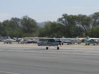 N704UT @ SZP - 1976 Cessna 150M, Continental O-200 100 Hp, landing roll Rwy 22 - by Doug Robertson