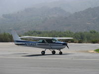 N704UT @ SZP - 1976 Cessna 150M, Continental O-200 100 Hp, landing roll Rwy 22 - by Doug Robertson