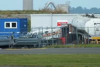 G-ESSX @ EGFF - PA-28 fuselage in the fire training area - by Chris Hall