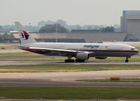 9M-MRQ @ AMS - Taxi to runway 27 of Schiphol Airport - by Willem Göebel