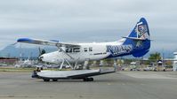 C-GHAG @ CYVR - Harbour Air #317 being dollied into place at the Fraser River Harbour Air hangar. - by M.L. Jacobs
