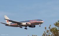 N327AA @ KJFK - Seconds before landing on L22, JFK - by gbmax