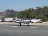 N5623K @ SZP - 1964 Beech 35 B33 DEBONAIR, Continental IO-470-K 225 Hp, landing roll Rwy 22 - by Doug Robertson