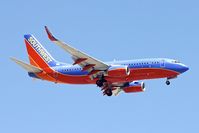 N725SW @ KSNA - On approach to John Wayne , Orange County Airport , Santa Ana , California - by Terry Fletcher