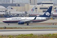 XA-QAM @ KLAX - At Los Angeles Airport , California - by Terry Fletcher