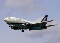 OY-API @ AMS - Landing on runway C18 of Schiphol Airport - by Willem Göebel