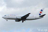 YU-AND @ EGLL - Photographed landing 27R at Heathrow. - by Noel Kearney