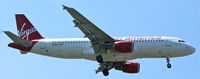 N635VA @ KLAX - Virgin America, is seen here on short finals RWY 24R at Los Angeles Int´l(KLAX) - by A. Gendorf