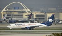 XA-AMK @ KLAX - Arriving at LAX - by Todd Royer