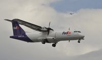 N816FX @ PANC - Arriving at Anchorage - by Todd Royer