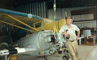 N16LR @ STS - Leif Ostnes in front of P-47 before cowling - by Jeanne Ostnes