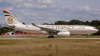 A6-EYM @ EDDF - departure via RW18W - by Friedrich Becker