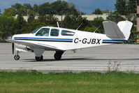 C-GJBX @ CYKZ - Lined up & ready to roll on runway 33 was this nice Bonanza with its neat looking Butterfly Tail. It was built in 1958 & lives in Toronto. I think people who are not even interested in aircraft still reconize this type. - by Chris Coates