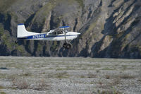N7564H - Taking off from gravel bar in the Arctic National Wildlife Refuge. - by qrk