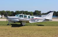 N66JT @ KOSH - Beech A36 - by Mark Pasqualino