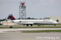 N936DL @ KSRQ - Delta Flight 1725 (N936DL) arrives at Sarasota-Bradenton International Airport following a flight from Hartsfield-Jackson Atlanta International Airport - by Donten Photography