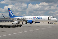 C-FXGG @ CYYZ - This 737 was parked on an infield cargo ramp where it was receiving some maintenance. It was built in 2000. - by Chris Coates