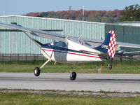 C-FFYL @ CYKZ - The pilot in this beautiful Cessna was leaning into a stiff crosswind as he touched down on runway 33. It used to live here but has since moved to Quebec. - by Chris Coates