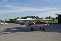 N140MA @ KCBF - Sitting on the ramp - by Floyd Taber