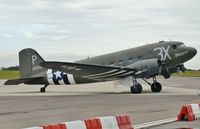 N473DC @ EGSH - Smokey engine start prior to departure. - by Graham Reeve