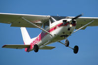 C-GSCP @ CYKZ - This little Cessna was about to land on runway 15 after returning from a training flight. It lives here & is a busy plane that's always flying with student pilots at the controls. - by Chris Coates