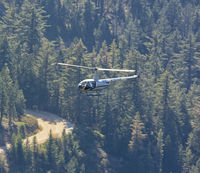 N7530B - Robinson R44 flying below in the Tahoe NF, Sierra Nevadas. - by M Gates