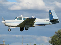 C-GMMM @ CYKZ - This blue Mooney was about to land on runway 33 that's 4,000 ft long. This fine airplane lives at this busy airport. - by Chris Coates