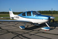 C-GUUU @ CYQA - This gorgeous Cirrus was resting alone in the late afternoon sunlight here at Muskoka Airport. I love the colour of this fast airplane. - by Chris Coates