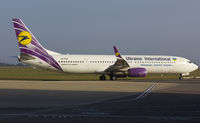 UR-PSK @ EGSH - Being towed from stand 6...