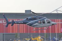 M-YMCM @ EGLC - Coming into land at Helitech 2013 at the ExCel centre next to London City Airport. - by Graham Reeve