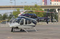 M-YMCM @ EGLC - Parked at Helitech 2013 at the ExCel centre next to London City Airport. - by Graham Reeve