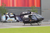 G-JESP @ EGLC - Parked at Helitech 2013 at the ExCel centre next to London City Airport.