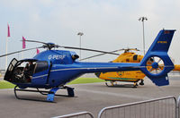 G-PERF @ EGLC - Parked outside Helitech 2013 at the ExCel Centre, next to London City Airport. - by Graham Reeve