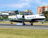 N228RE @ TNCM - N228RE