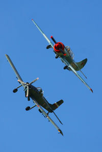 G-TYAK @ EGBR - G-TYAK Betsy Yak-52 and G-BSXD Soko P-2 Kraguj at Breighton's Heli Fly-in, 2013 - by Chris Hall