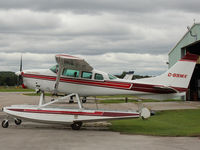 C-GSMX @ CYKZ - 1980 Cessna Stationair 6 on floats, sits outside a hanger at the Buttonville Airport north of Toronto. - by Ron Coates