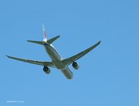 B-2038 @ KJFK - Over Breezy Point...going to a landing @ JFK.... - by Gintaras B.