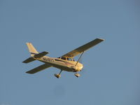 N5197T @ KOSH - heading west from Oshkosh - by steveowen