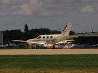 N877MV @ KOSH - Landing Oshkosh - by steveowen