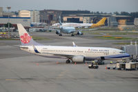 B-18610 @ WSSS - China Airlines Boeing 737-800 at the terminal of Singapore Changi airport. - by Henk van Capelle